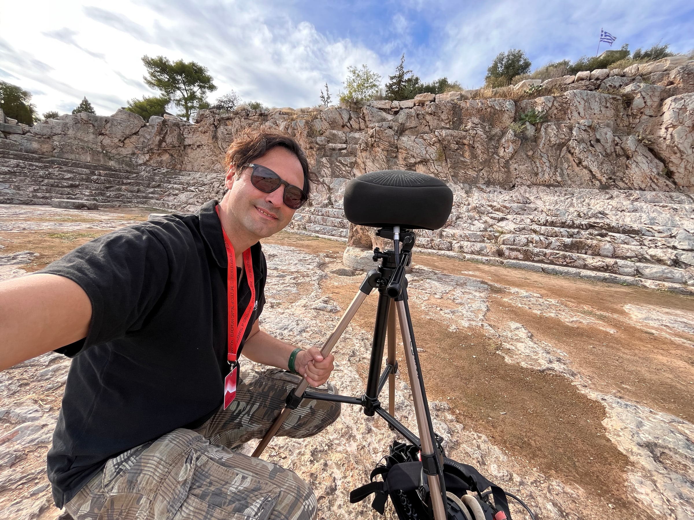 Yannis Antipas recording location sound at an ancient Greek theatre